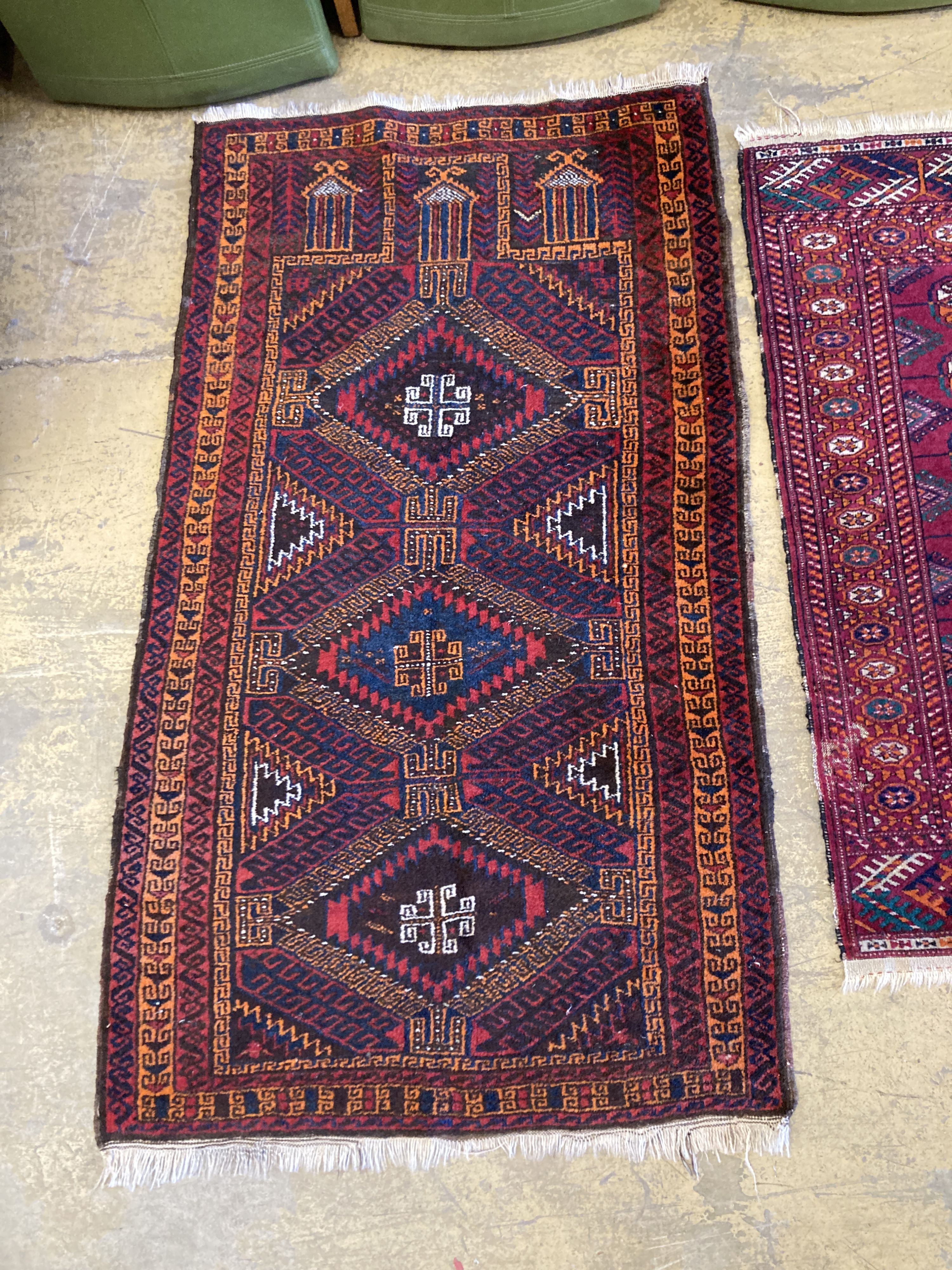 Two early 20th century flatweave rugs, a Bokhara rug and a Belouch rug, largest 220 x 160cm
